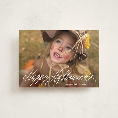 This is a ghostly white halloween party invitations cards with standard by Hooray Creative called spooky script printing on signature in postcard