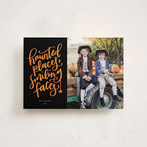 This is a midnight halloween party invitations cards by Amy Payne called smiling faces printing on signature in postcard