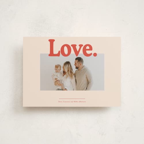This is a ivory valentine postcards with standard by Baumbirdy called love is printing on signature in postcard