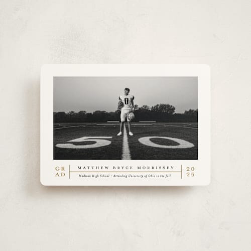 This is a golden graduation announcements with standard by Erica Krystek called modern grid printing on signature in petite