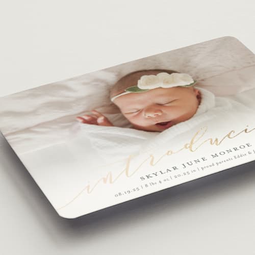 This is a slate birth announcement magnets with foil pressed by Sarah Brown called treasured printing on magnet paper in magnet