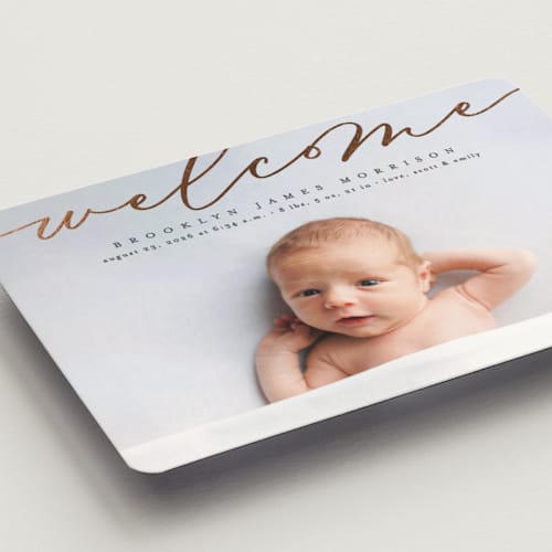 This is a charcoal birth announcement magnets with foil pressed by Erica Krystek called welcome ribbon printing on magnet paper in magnet