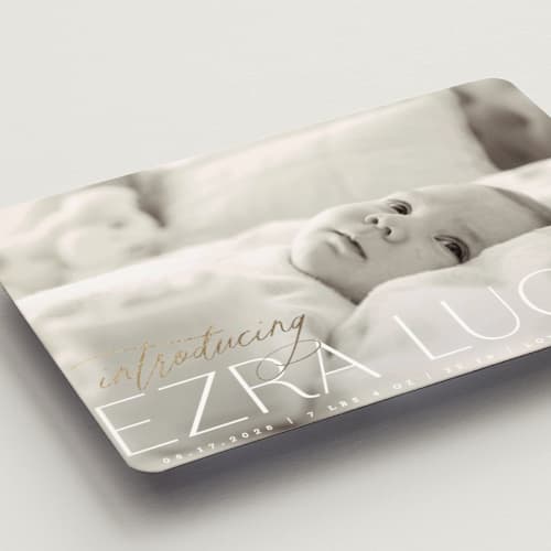 This is a ice birth announcement magnets with foil pressed by Everett Paper Goods called flourished printing on magnet paper in magnet