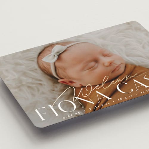 This is a cotton birth announcement magnets with foil pressed by Everett Paper Goods called welcoming printing on magnet paper in magnet