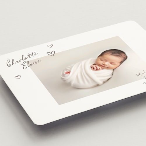 This is a sand birth announcement magnets with standard by Pixel and Hank called written printing on magnet paper in magnet