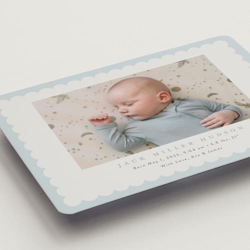 This is a sky birth announcement magnets with standard by Nicoletta Savod called charmed printing on magnet paper in magnet