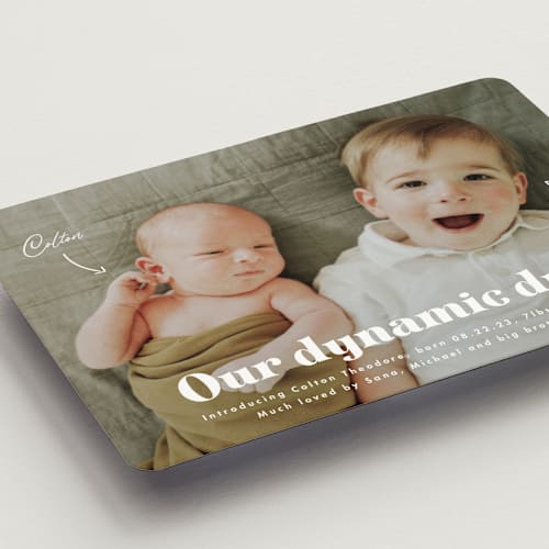 This is a cotton birth announcement magnets with standard by Corinne Malesic called dynamic duo printing on magnet paper in magnet