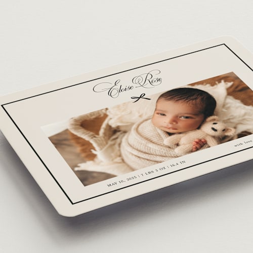 This is a charcoal birth announcement magnets with standard by Chelsea Petaja called elegant bow holiday printing on magnet paper in magnet