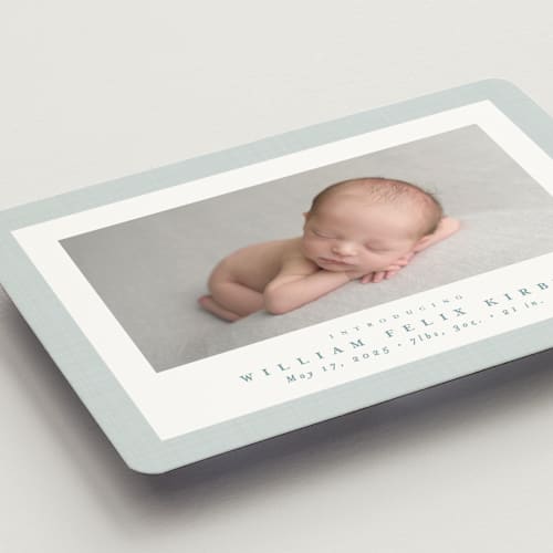 This is a powder birth announcement magnets with standard by Lea Delaveris called linen frame printing on magnet paper in magnet