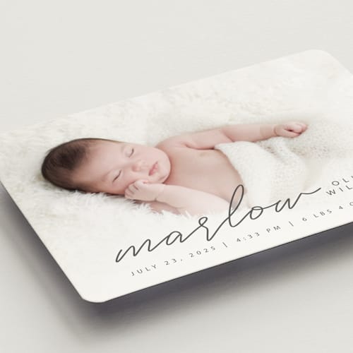 This is a graphite birth announcement magnets with standard by Megan Cash called marlow printing on magnet paper in magnet