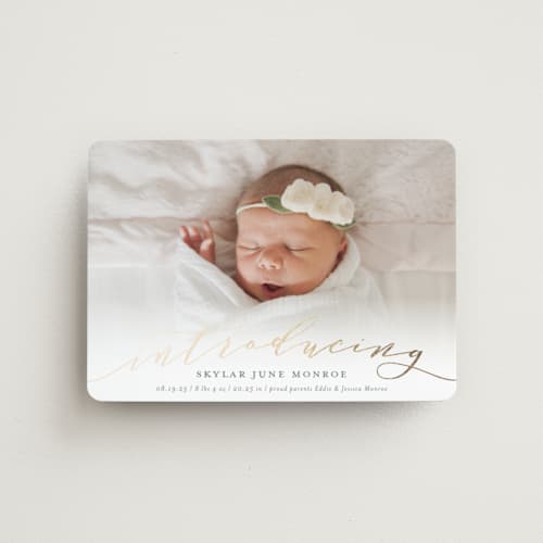 This is a slate birth announcement magnets with foil pressed by Sarah Brown called treasured printing on magnet paper in magnet