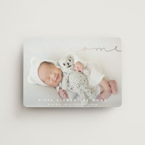 This is a cloud birth announcement magnets with foil pressed by Olivia Raufman called delicate welcome printing on magnet paper in magnet