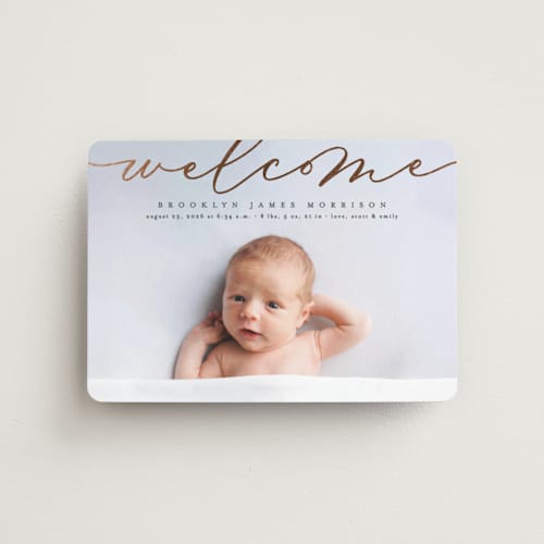 This is a charcoal birth announcement magnets with foil pressed by Erica Krystek called welcome ribbon printing on magnet paper in magnet