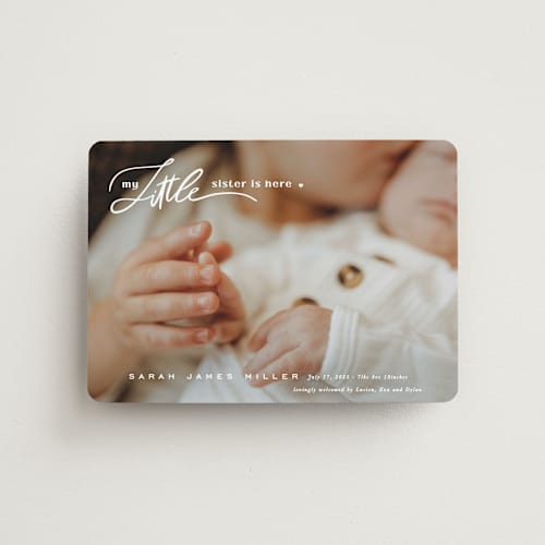 This is a cotton birth announcement magnets with standard by Creo Study called sibling intro printing on magnet paper in magnet