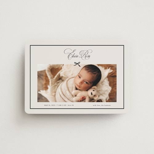 This is a charcoal birth announcement magnets with standard by Chelsea Petaja called elegant bow holiday printing on magnet paper in magnet