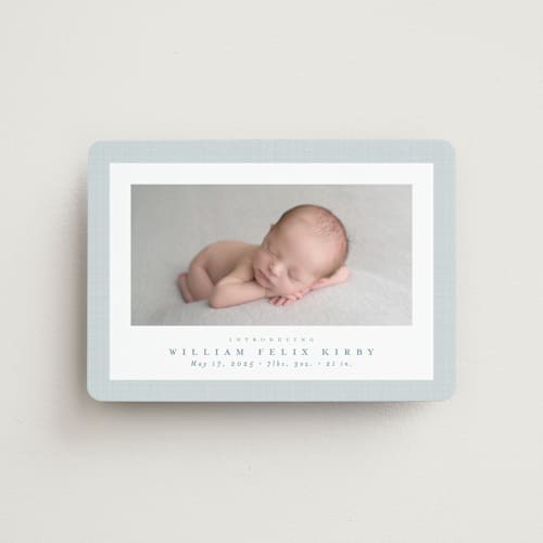 This is a powder birth announcement magnets with standard by Lea Delaveris called linen frame printing on magnet paper in magnet