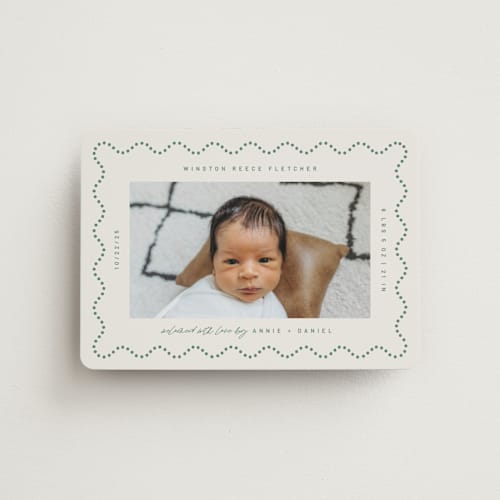 This is a moss birth announcement magnets with standard by Kelly Watkins called squiggle printing on magnet paper in magnet