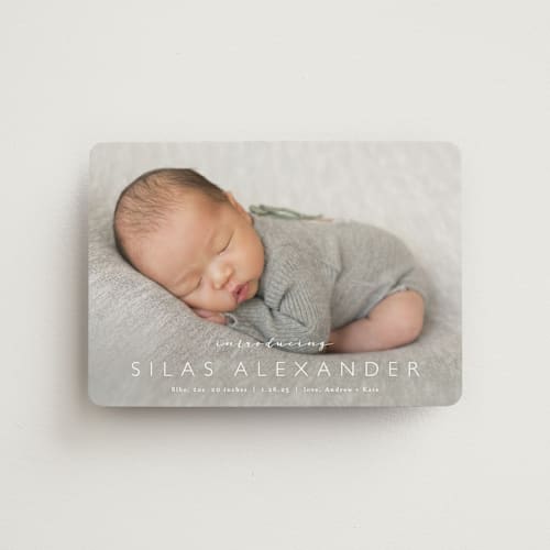 This is a cloud birth announcement magnets with standard by Carolyn MacLaren called baby bliss printing on magnet paper in magnet