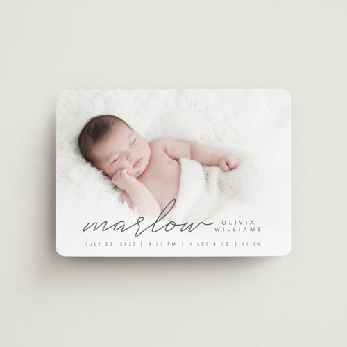 This is a graphite birth announcement magnets with standard by Megan Cash called marlow printing on magnet paper in magnet