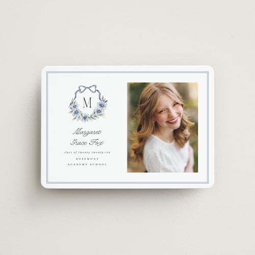 This is a cornflower graduation announcements with standard by Laura Hankins called floral crest printing on magnet paper in magnet