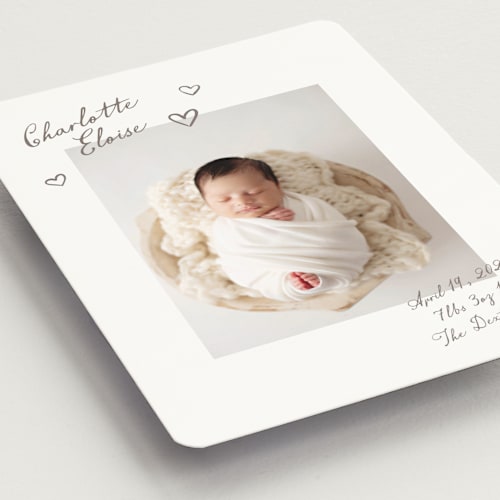 This is a sand birth announcement magnets with standard by Pixel and Hank called written printing on magnet paper in magnet
