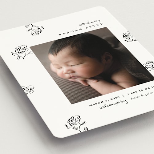 This is a lily of the valley birth announcement magnets with standard by Pixel and Hank called the flora printing on magnet paper in magnet