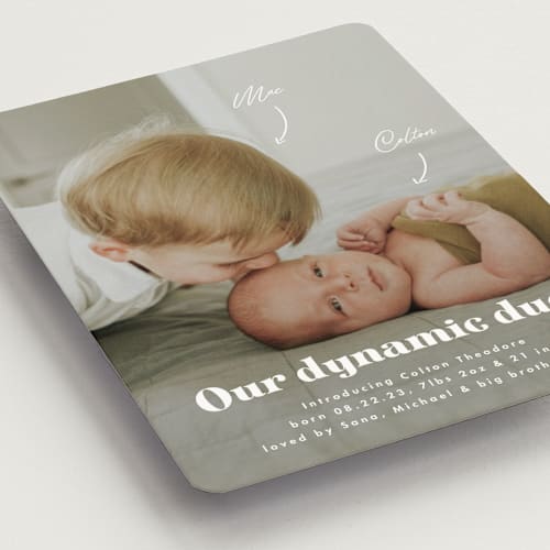 This is a cotton birth announcement magnets with standard by Corinne Malesic called dynamic duo printing on magnet paper in magnet