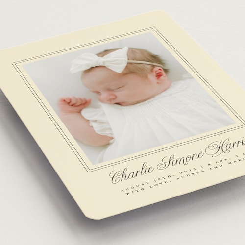 This is a creme birth announcement magnets with standard by mo kelley called classical border printing on magnet paper in magnet