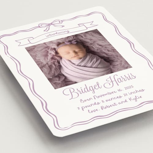 This is a lavander birth announcement magnets with standard by Cass Loh called bow frame printing on magnet paper in magnet
