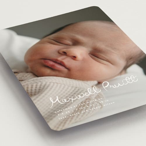 This is a snow birth announcement magnets with standard by Lauren Chism called written whimsy printing on magnet paper in magnet