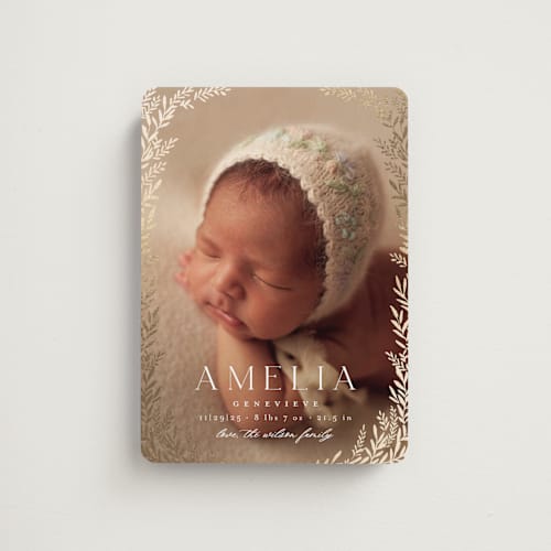 This is a vanilla birth announcement magnets with foil pressed by Laura Hankins called botanica frame printing on magnet paper in magnet