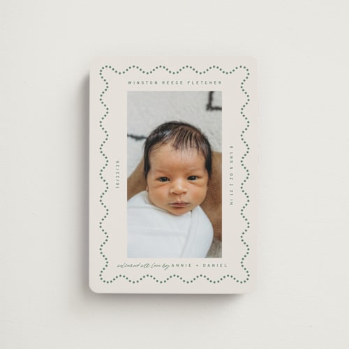 This is a moss birth announcement magnets with standard by Kelly Watkins called squiggle printing on magnet paper in magnet