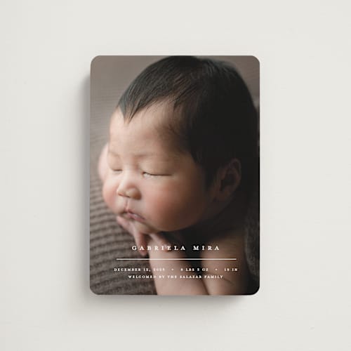 This is a vanilla birth announcement magnets with standard by Pixel and Hank called primary printing on magnet paper in magnet