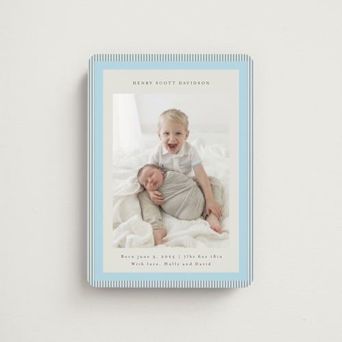 This is a powder blue birth announcement magnets with standard by Jackie Crawford called modern striped frame printing on magnet paper in magnet