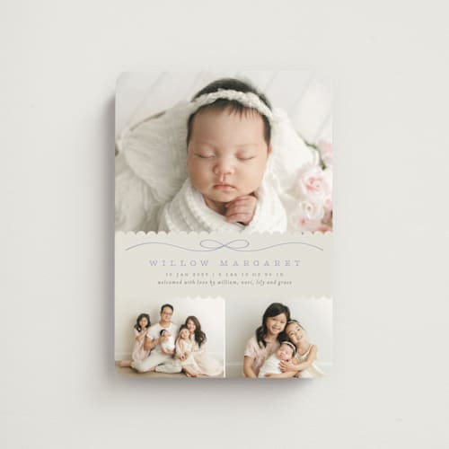 This is a periwinkle birth announcement magnets with standard by Laura Hankins called scallops printing on magnet paper in magnet