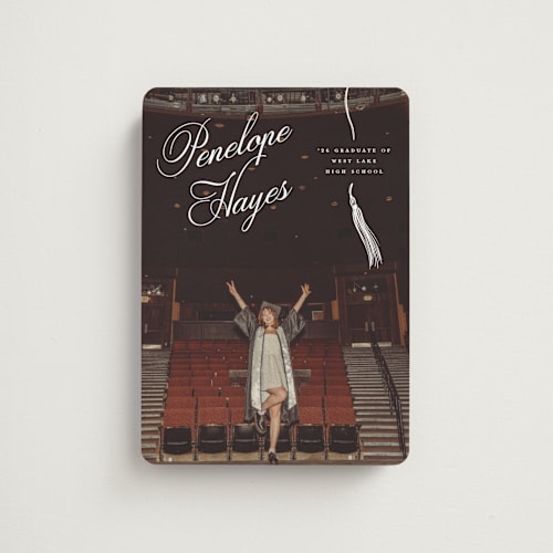 This is a snow graduation announcements with standard by Pixel and Hank called tassel type printing on magnet paper in magnet