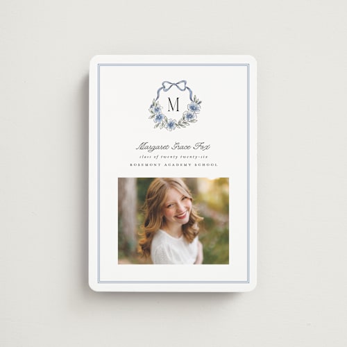 This is a cornflower graduation announcements with standard by Laura Hankins called floral crest printing on magnet paper in magnet