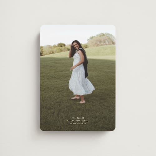 This is a cream graduation announcements with standard by JoAnn Jinks called titled printing on magnet paper in magnet