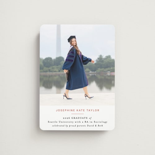 This is a tangerine graduation announcements with standard by Alethea and Ruth called simply stated printing on magnet paper in magnet