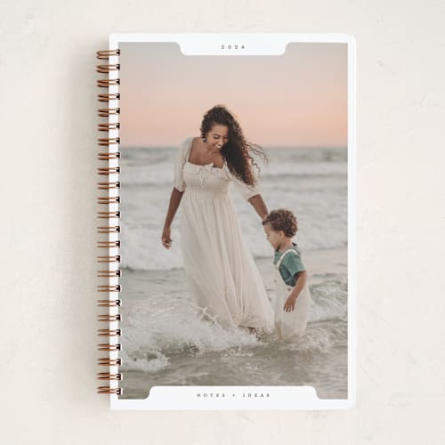 This is a snow journals with standard by Gwen Bedat called holiday file printing on premium cover stock in notebook