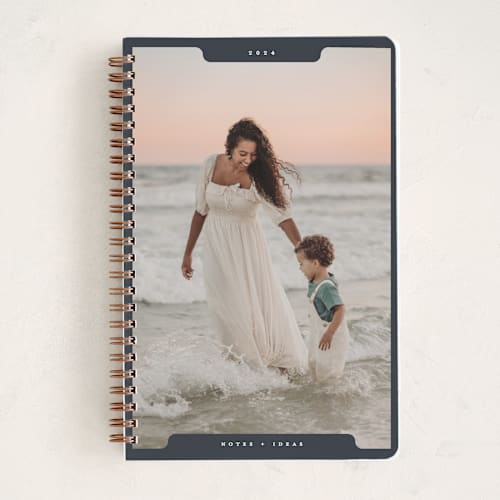 This is a midnight journals with standard by Gwen Bedat called holiday file printing on premium cover stock in notebook