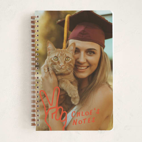 This is a tangerine journals with standard by Ekko Studio called peace out printing on premium cover stock in notebook