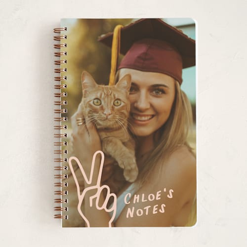 This is a burnt rose journals with standard by Ekko Studio called peace out printing on premium cover stock in notebook