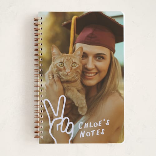 This is a periwinkle journals with standard by Ekko Studio called peace out printing on premium cover stock in notebook