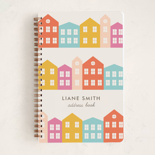 This is a persimmon journals with standard by Amber Barkley called little houses printing on premium cover stock in notebook