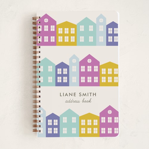 This is a fuchsia journals with standard by Amber Barkley called little houses printing on premium cover stock in notebook