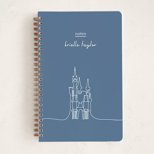 This is a midnight journals with standard by Britt Mills called the castle from disney's cinderella printing on premium cover stock in notebook