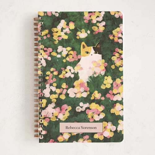This is a daffodil journals with standard by Sabrina Excene called flower meadow cat printing on premium cover stock in notebook