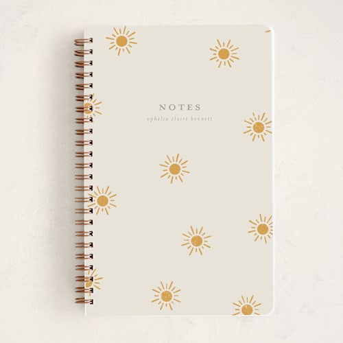 This is a golden sun journals with standard by Meggy Masters called sun toss printing on premium cover stock in notebook