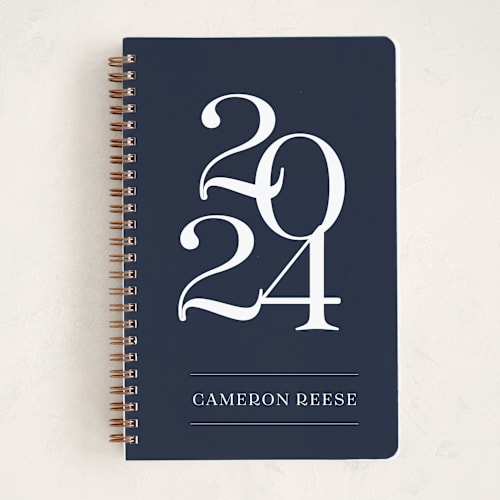 This is a navy journals with standard by Ester M Nersisyan called bold year printing on premium cover stock in notebook